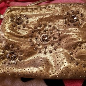 Gold tone rhinestone studded purse